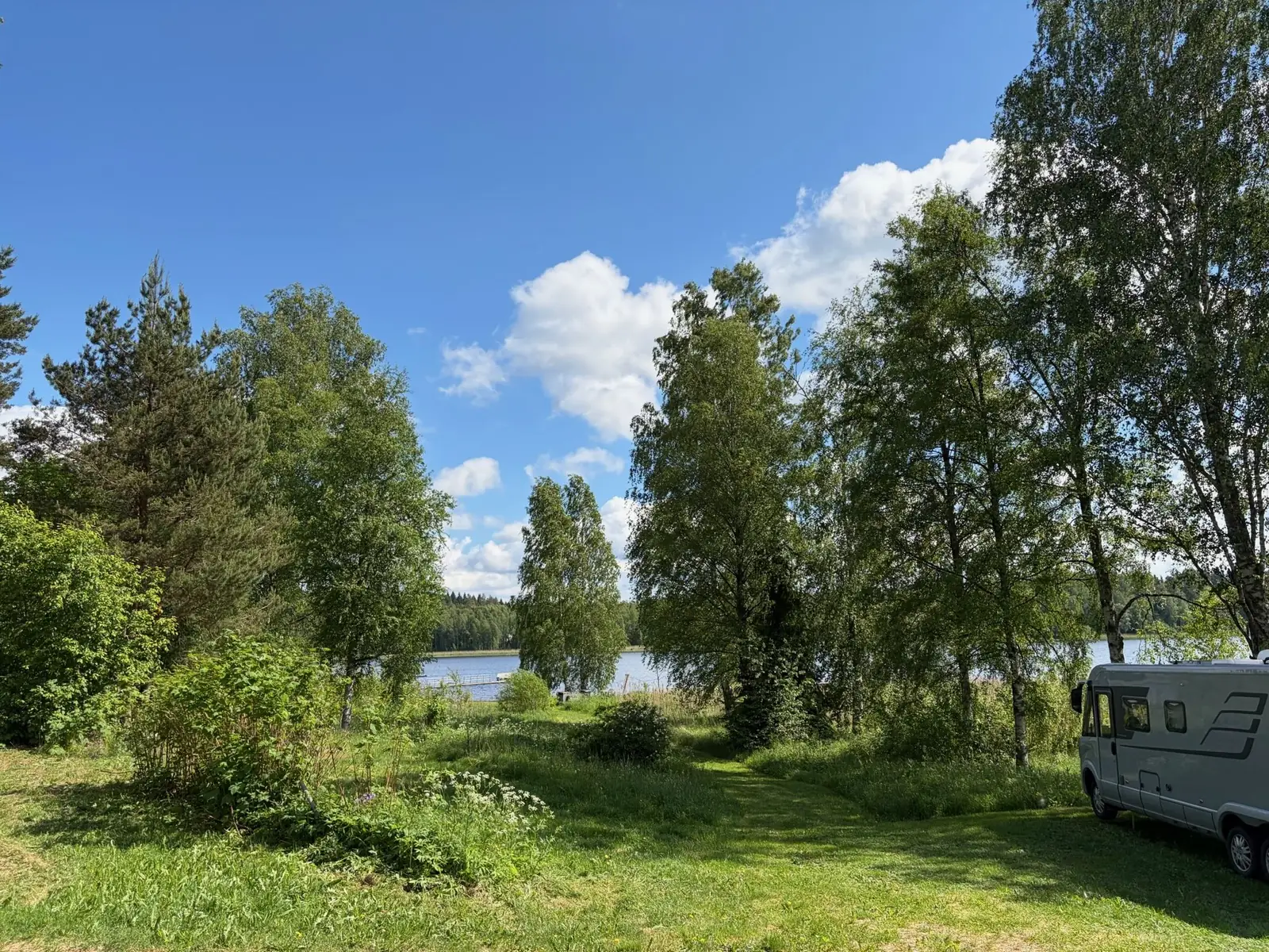 lakeside pitch at Taika Camping